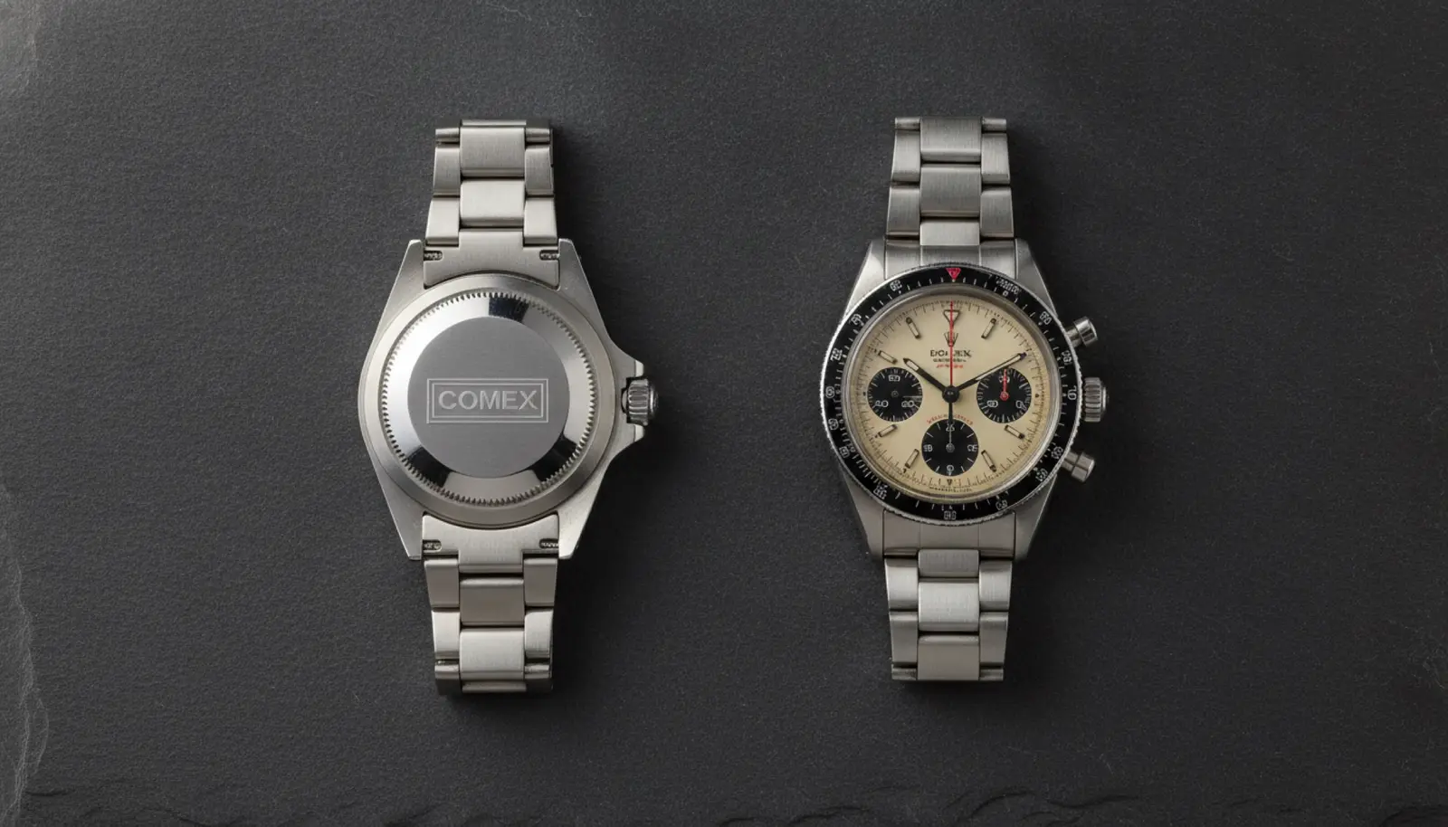 Artcurial Monaco müzayedesine giren iki vintage Rolex — COMEX Sea-Dweller ve Paul Newman kadranı — koyu taş yüzeyde sergilenmiş
